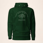 Antrim Giant’s Causeway forest green hoodie on a warm ivory background