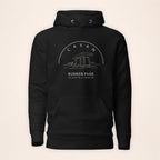 Cavan Burren Park black hoodie front on warm ivory background