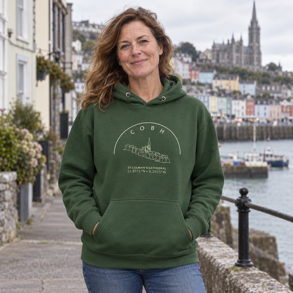 Woman wearing the Cork Cobh forest green hoodie in Cobh