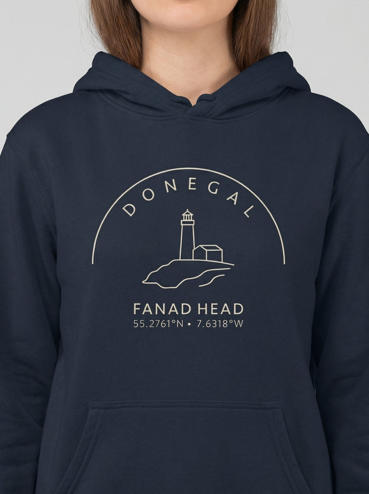 Navy blue hoodie with Donegal Fanad Head design on a gray background