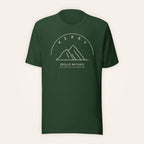 Kerry Skellig Michael forest green T-shirt on warm ivory background