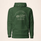 Kildare Sallins forest green hoodie on a warm ivory background